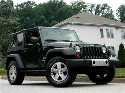 Clean 2007 4x4 jeep wrangler alloys 6-speed...all it needs is a surf board