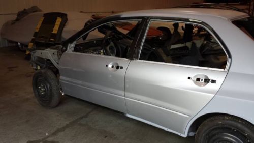 2006 mitsubishi evo rolling shell, frame has be aligned and is in perfect shape