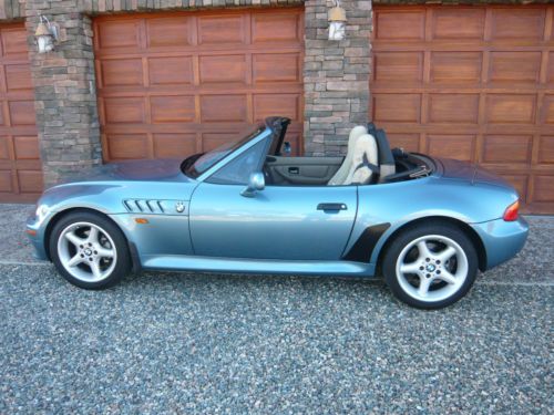 1999 z3 2.8 roadster, light blue with tan interior and top. very low miles.