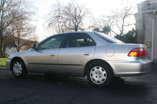 99 honda accord lx - silver heather mist metallic. clean car and great drive.