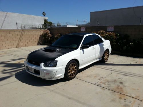 White w/gold wheels. brand new long block. owned &amp; maintained by subaru tech